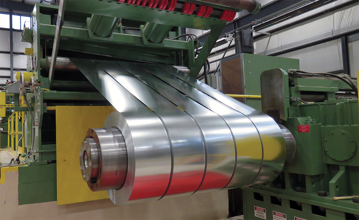Coils are automatically down-laid, strapped, sorted, packaged, weighed and stretch wrapped for shipment.