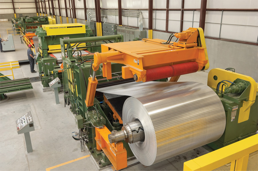 Three quarter view of factory line of sheet processors