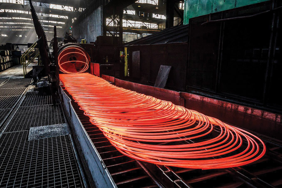 View of hot molten wire on an factory conveyor line
